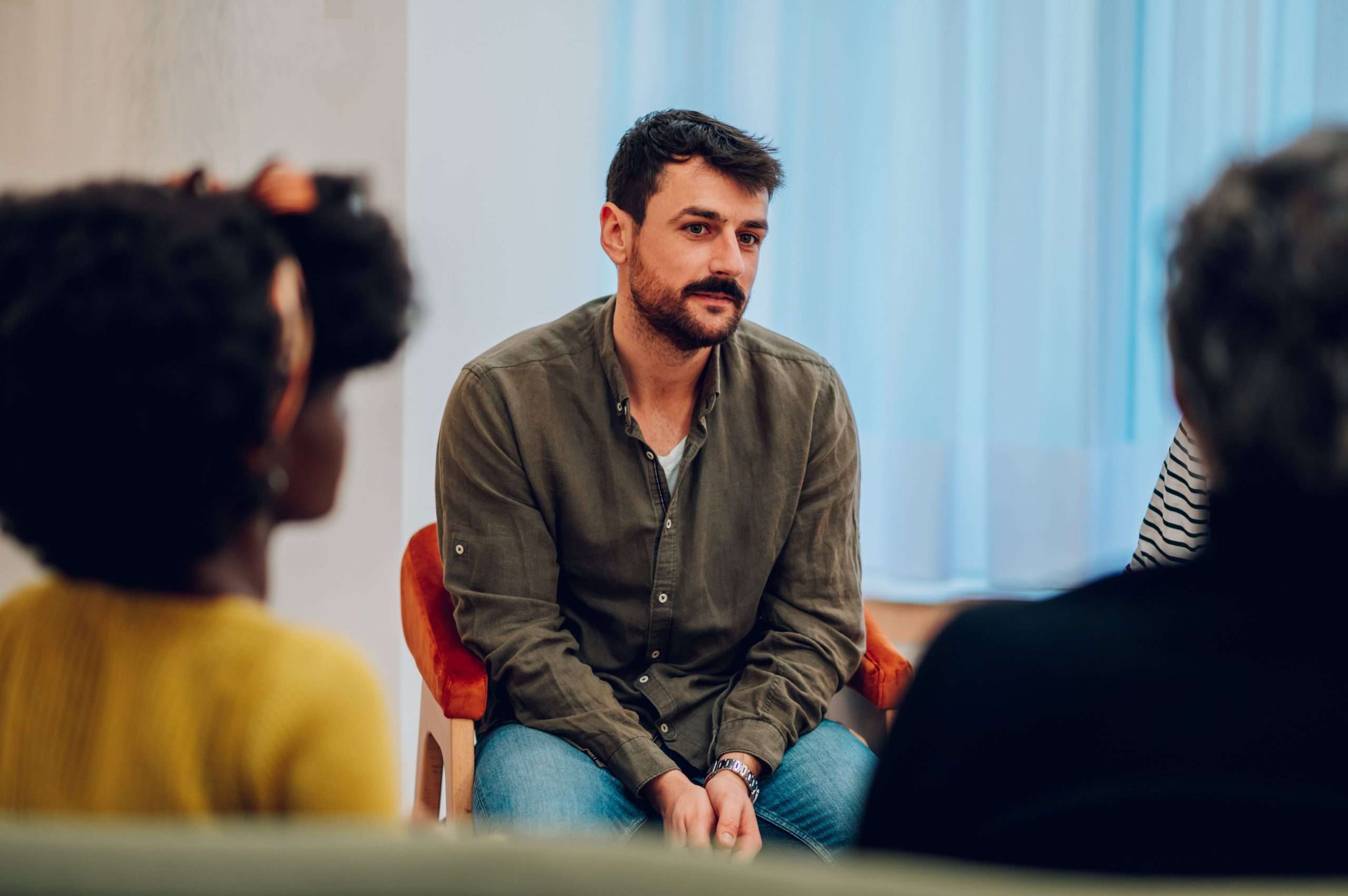 Group therapy during addiction treatment in Utah.