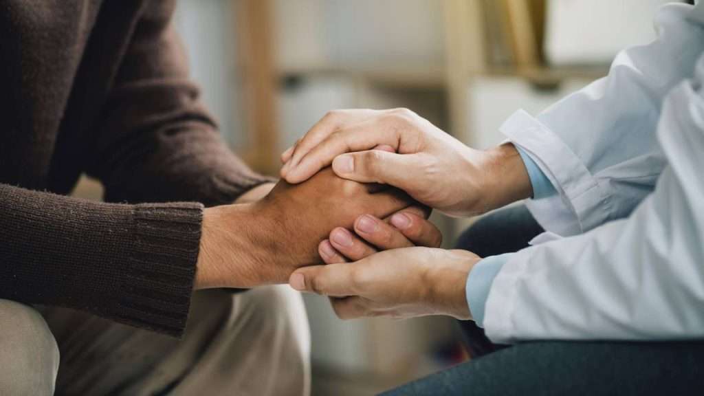 Patient receiving medical support and discussing how to help your partner with addiction.
