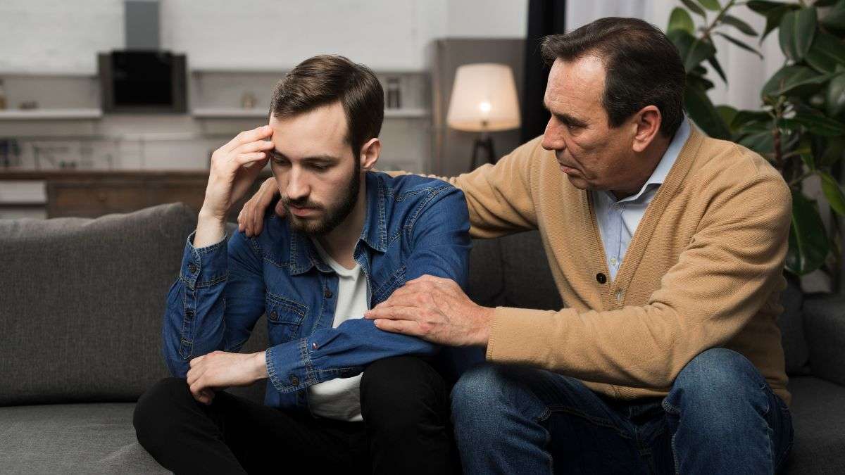 A man talking to his son and encouraging him to start dual diagnosis treatment in Utah.