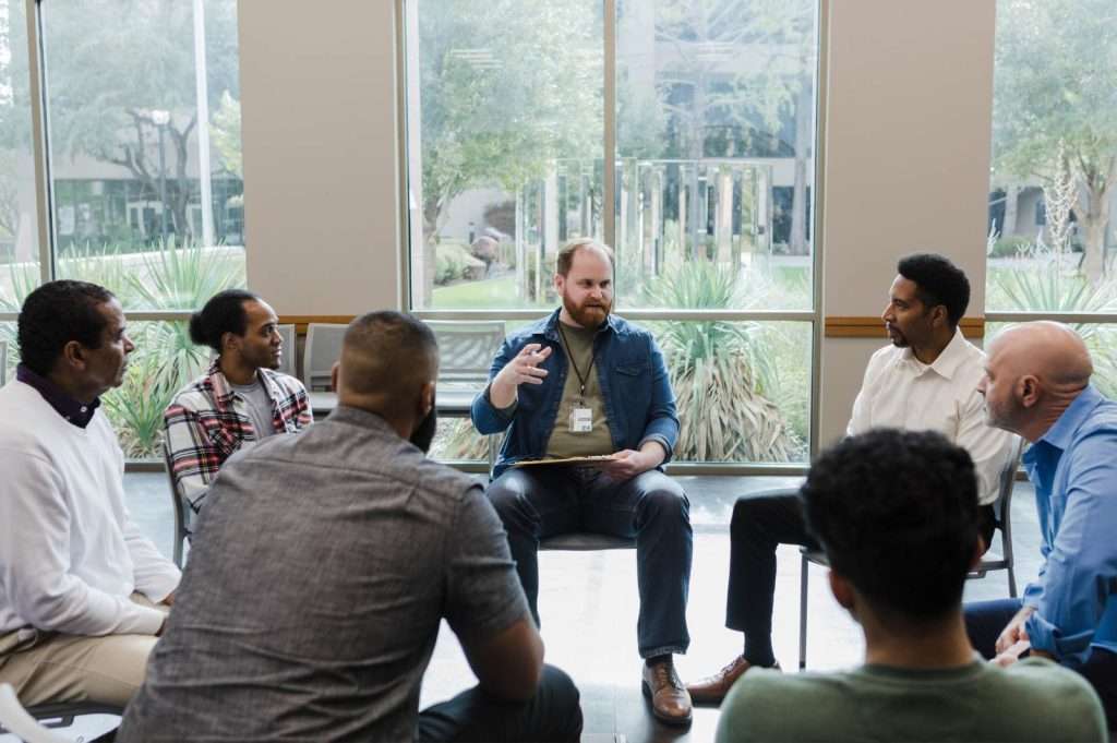 Men's group therapy as part of alcohol detox program in Utah.