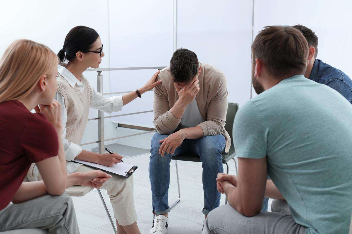 Supportive family therapy session at an addiction treatment center in Utah.