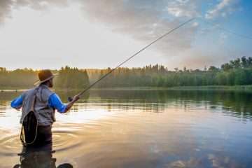 A man fishing during experiential therapy in Utah.