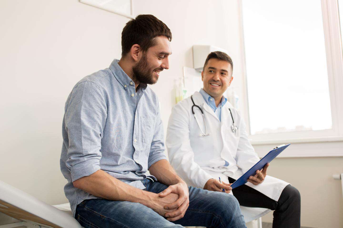 Healthcare professional consulting with a client at an addiction treatment center in Utah.
